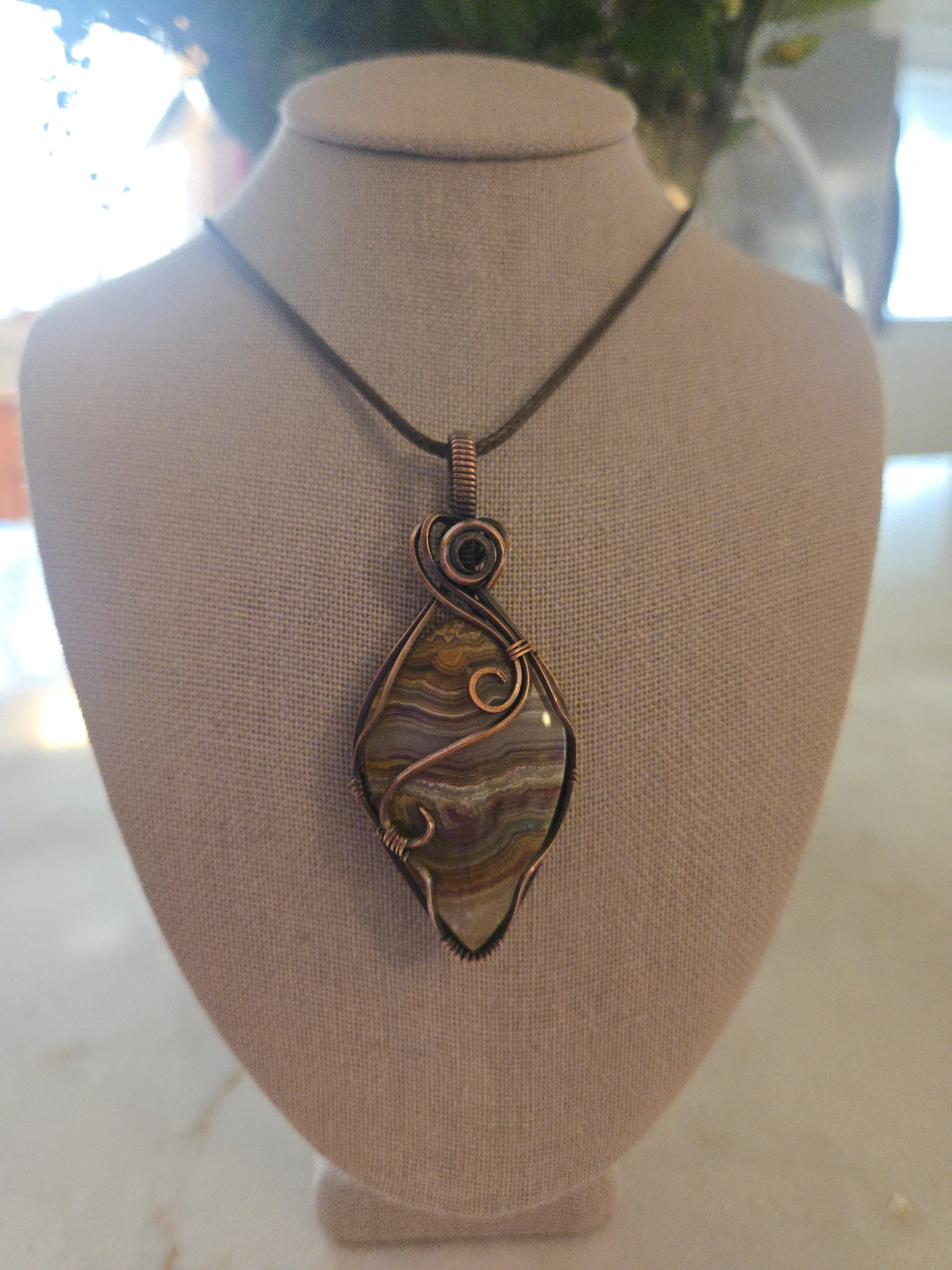 Crazy Lace Agate in Antiqued Copper Wire